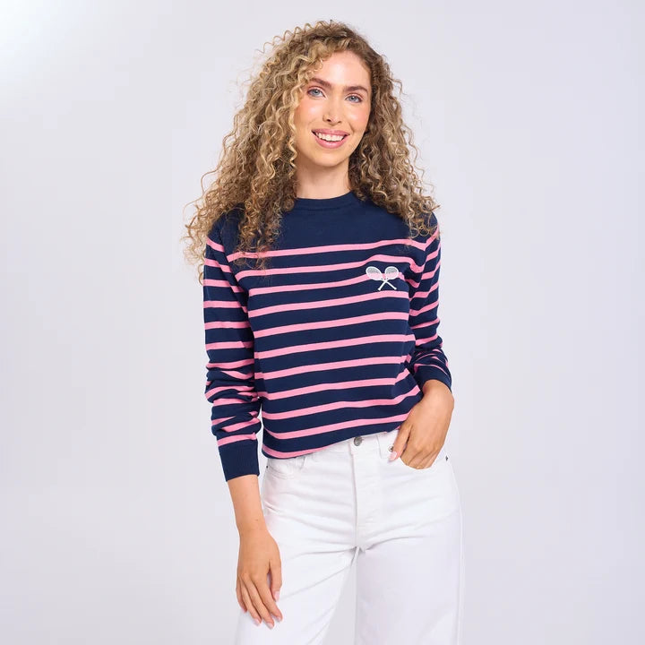 Model wearing the Ame & Lulu women's Club Sport Sweater in pink and navy stripes