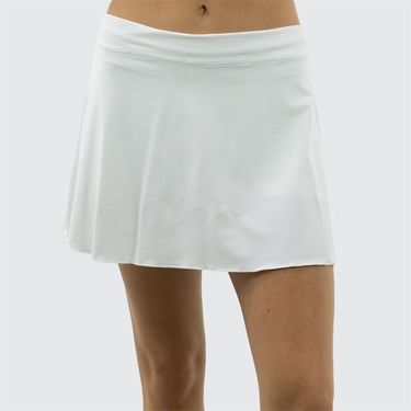 White tennis skirt worn by a person on a plain background