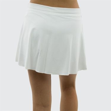 White tennis skirt worn by a person on a white background
