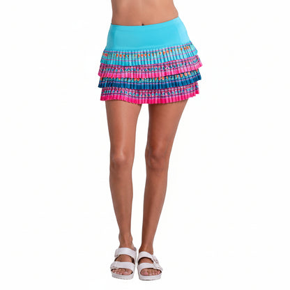 Colorful floral print skirt worn by a female on a white background