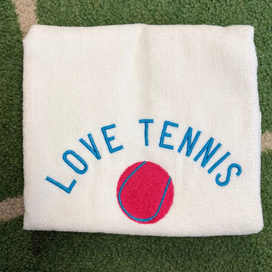 Love Tennis with a pink tennis ball embroidered on a white terry towel