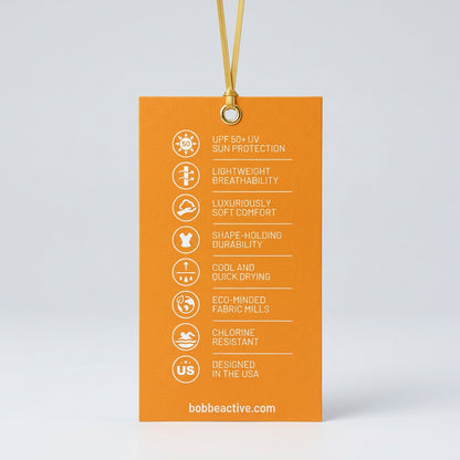 Bobbe performance fabric hangtag showing UPF 50+ and lightweight quick-drying features
