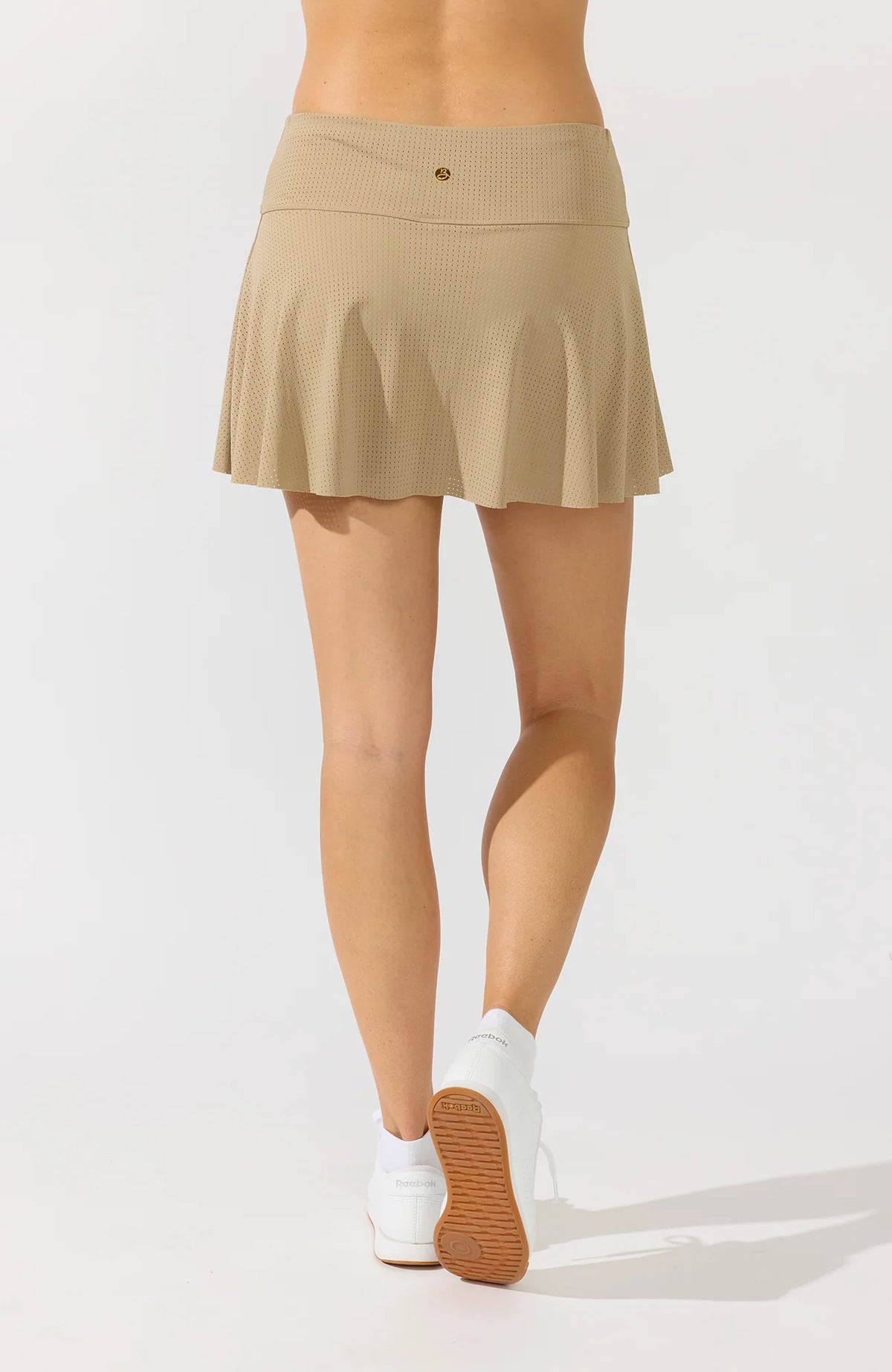 Rear view of Bobbe women's Varsity 14-inch skort in Dust